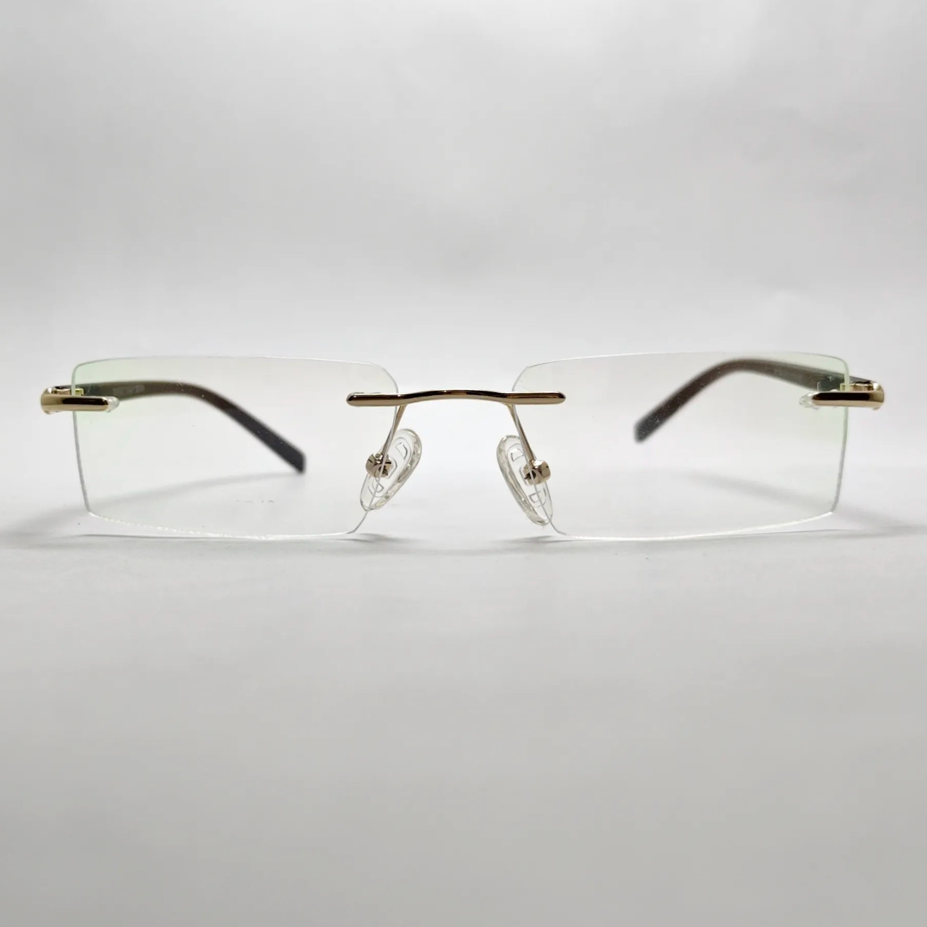 Untitled Project - 2026-06-29T135346.566 Dark Brown Rimless Rectangular Eyeglass - Image 1